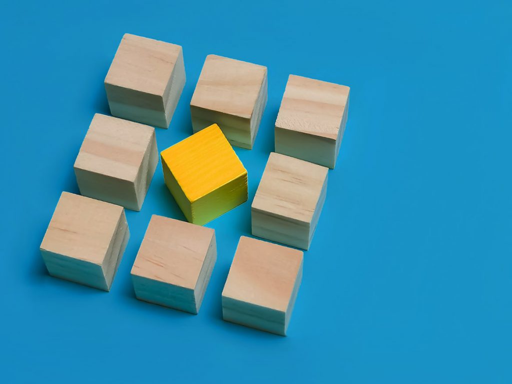 wooden cubes with yellow in the middle